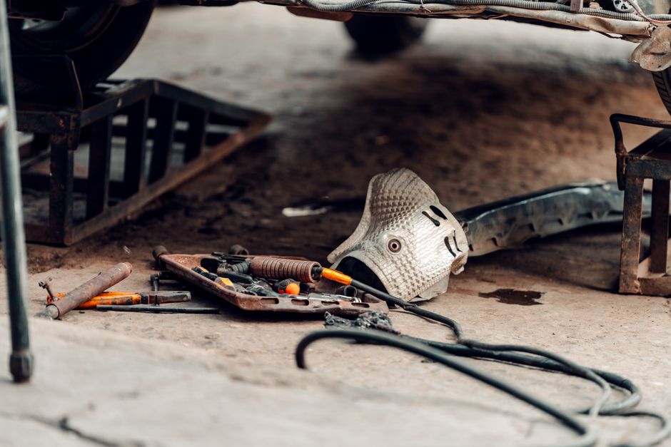 A detailed view of automotive tools and equipment in a workshop, perfect for repair and maintenance.